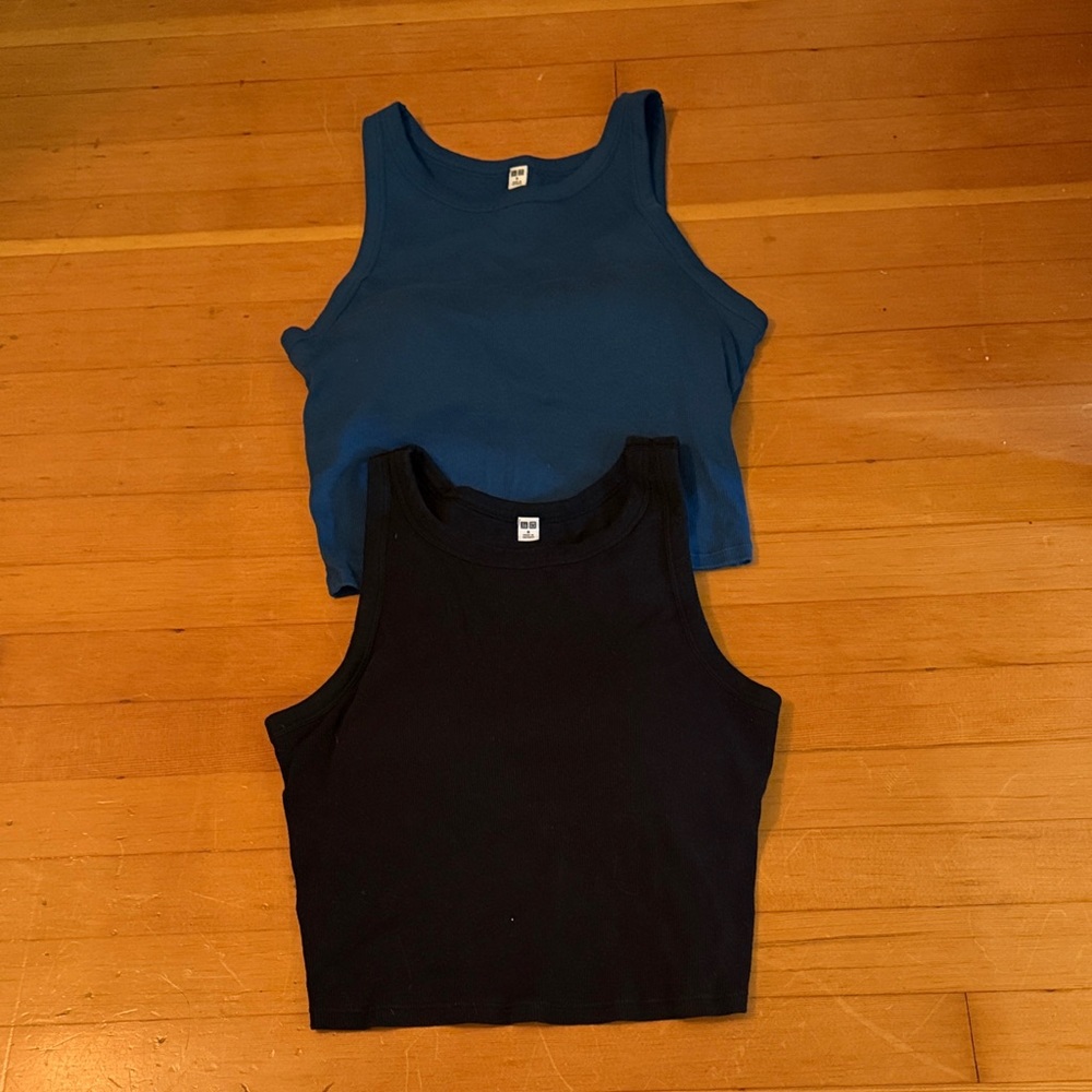 Uniqlo Black and Dark Blue Crew Neck Tees
Two with purchase